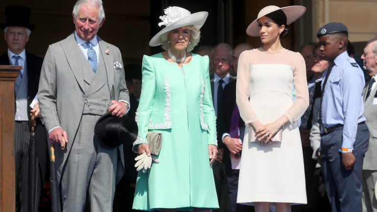 O príncipe Carlos, Camilla e Meghan Markle