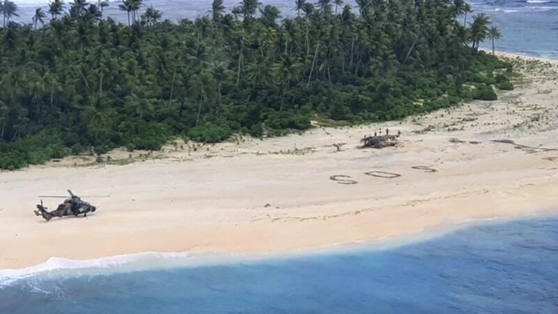 Três homens retidos numa ilha escrevem “SOS” na areia e são salvos