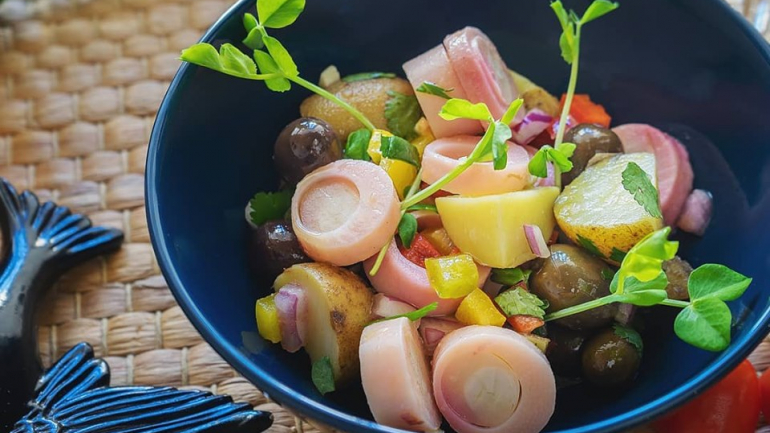 Salada de polvo, sem polvo. O Outro Lado não deixa de servir petiscos algarvios, mas desta vez o polvo e substituído por palmito