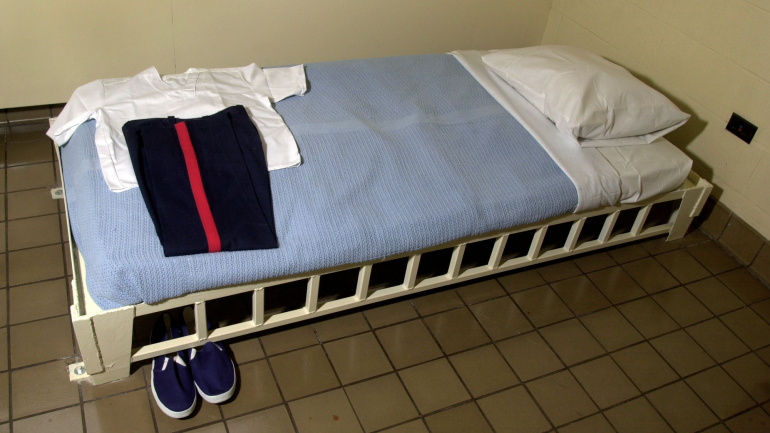 A cama onde os reclusão dormem no dia antes da pena de morte